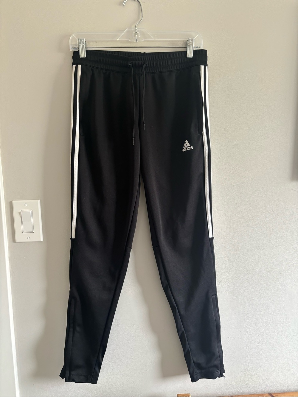 Adidas Tiro black track pants with white stripe